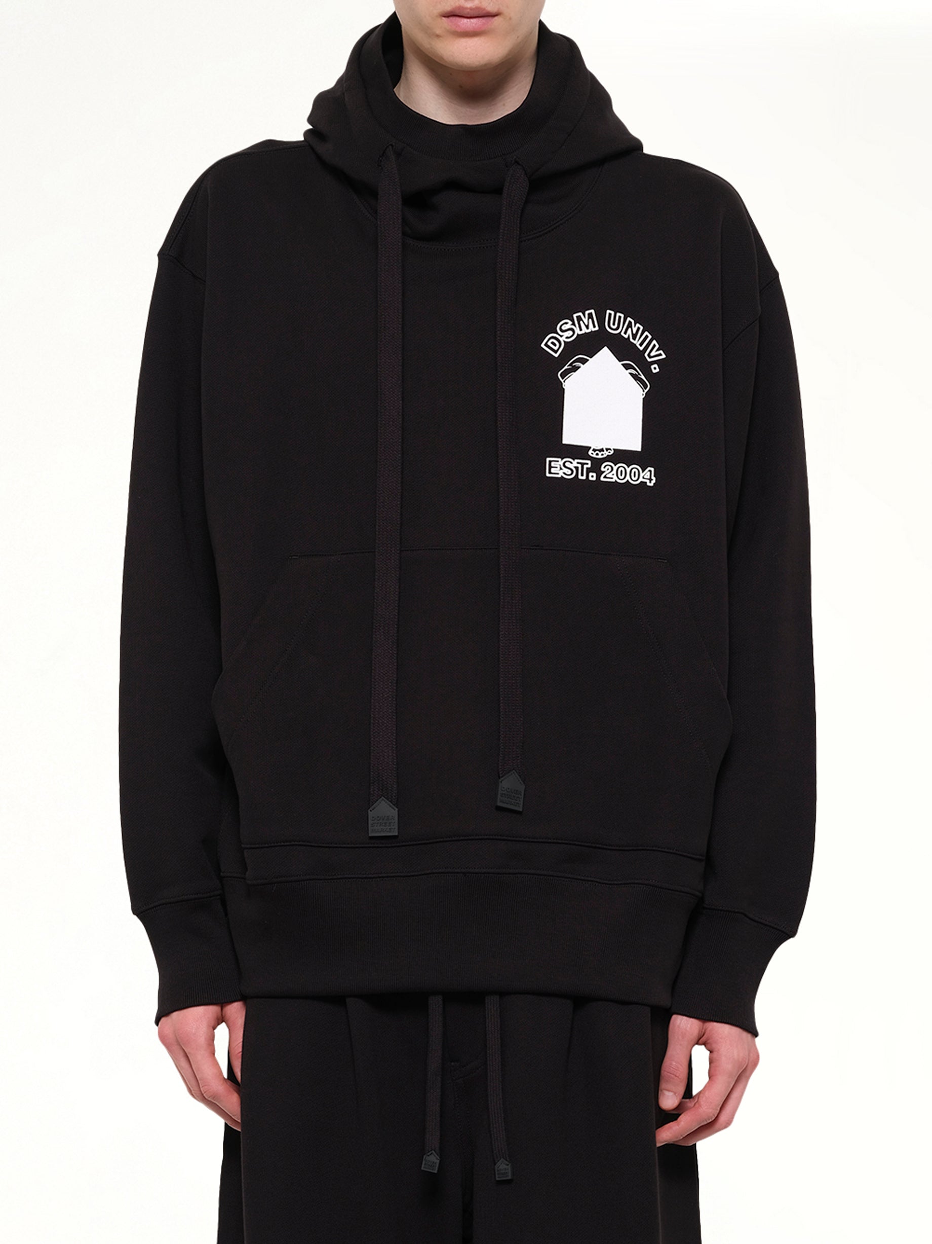 Image of a model wearing Outerwear. Product name - Pile Knit Oversized Hoodie in Black colour by brand - DSM KEI NINOMIYA
