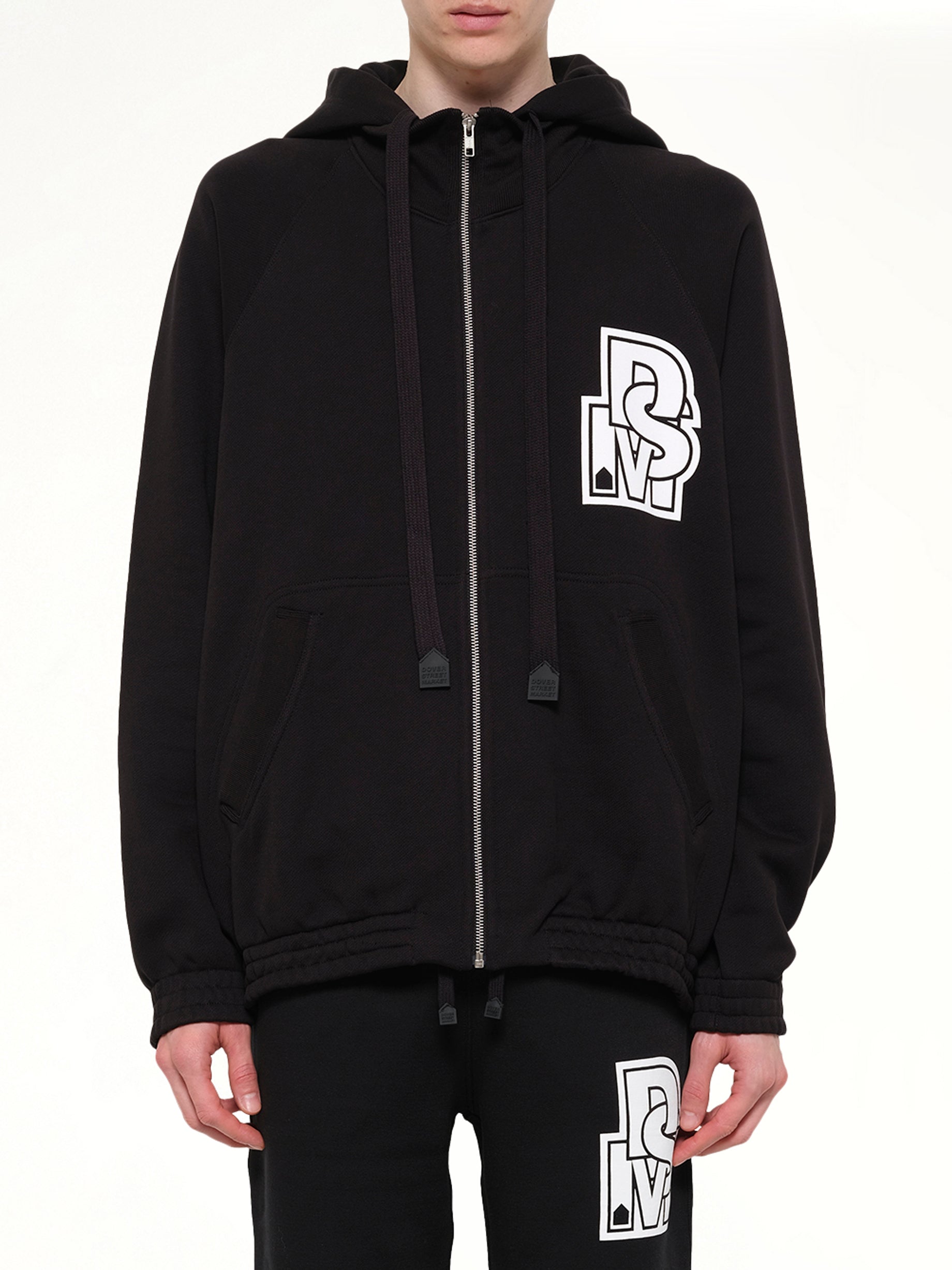 Image of a model wearing Outerwear. Product name - Pile Knit Zipped Hoodie in Black colour by brand - DSM KEI NINOMIYA