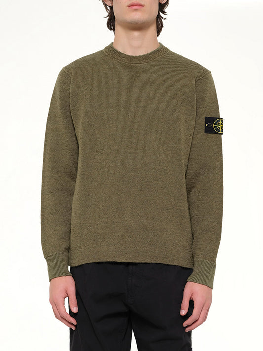Image of a model wearing Outerwear. Product name - 5100015 Crew Neck in Green colour by brand - STONE ISLAND