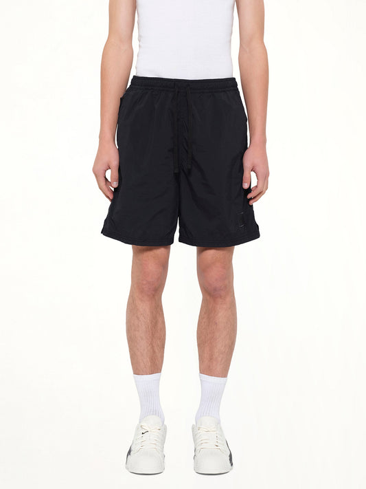 Image of a model wearing Shorts. Product name - B100006 Shorts in Navy colour by brand - STONE ISLAND