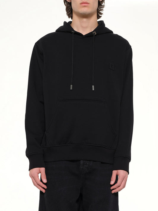 Image of a model wearing Outerwear. Product name - Flower Back Print Hoodie in Black colour by brand - WOOYOUNGMI