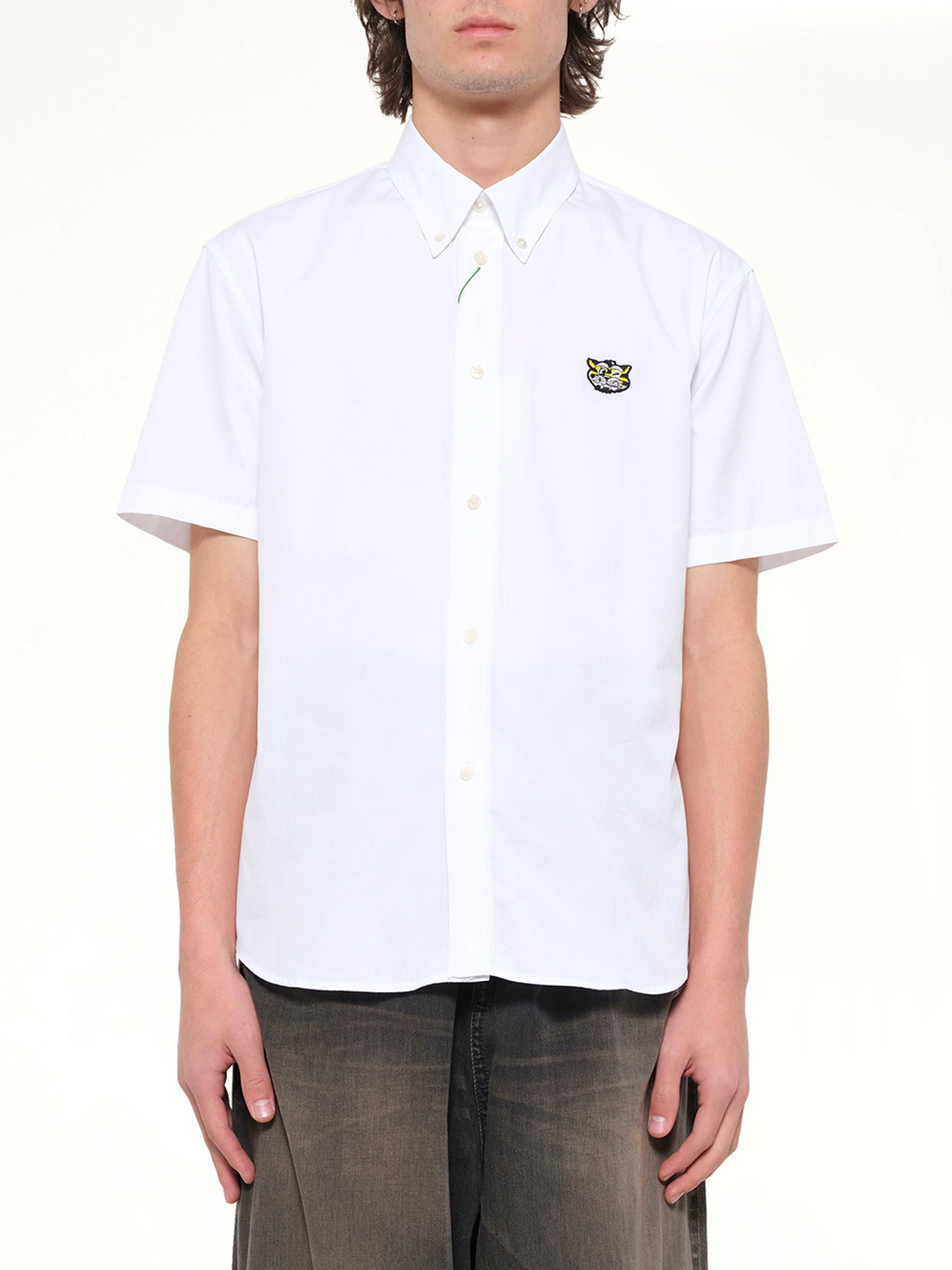 Image of a model wearing Tops. Product name - Kenzo Wild Tiger Crest Short Sleeve Shirt in White colour by brand - KENZO