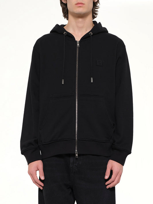 Image of a model wearing Outerwear. Product name - WYM Zip Hoodie in Black colour by brand - WOOYOUNGMI