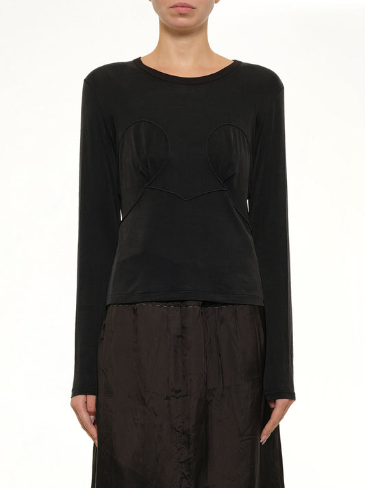 Image of a model wearing Tops. Product name - Cut-out Long Sleeve T-Shirt in Black colour by brand - MAISON MARGIELA
