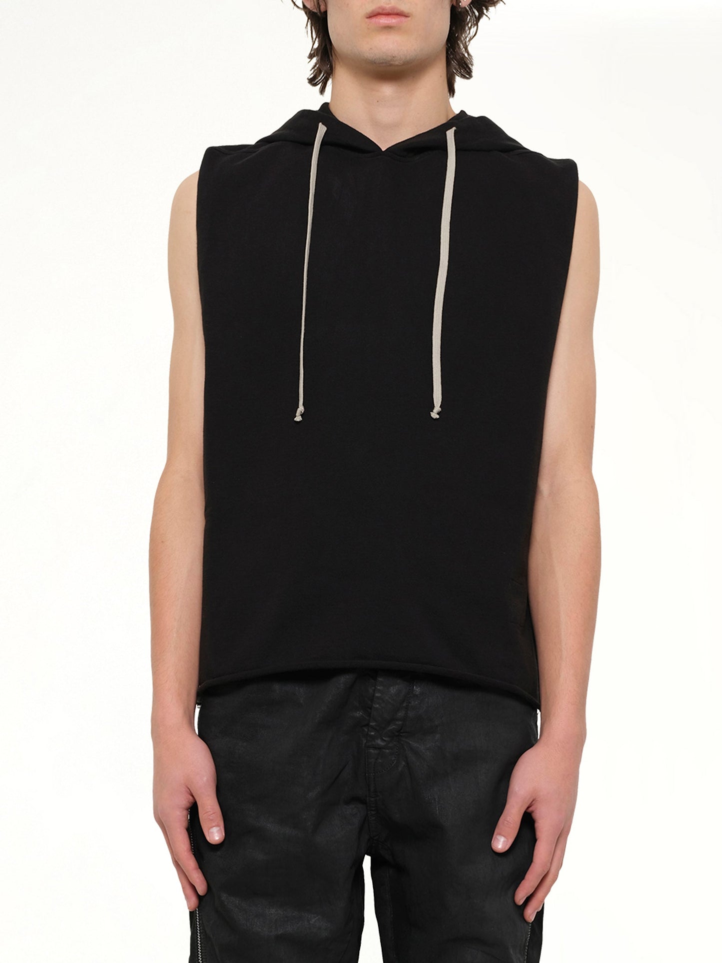 Image of a model wearing Outerwear. Product name - Hooded Tunic in Black colour by brand - RICK OWENS DRKSHDW