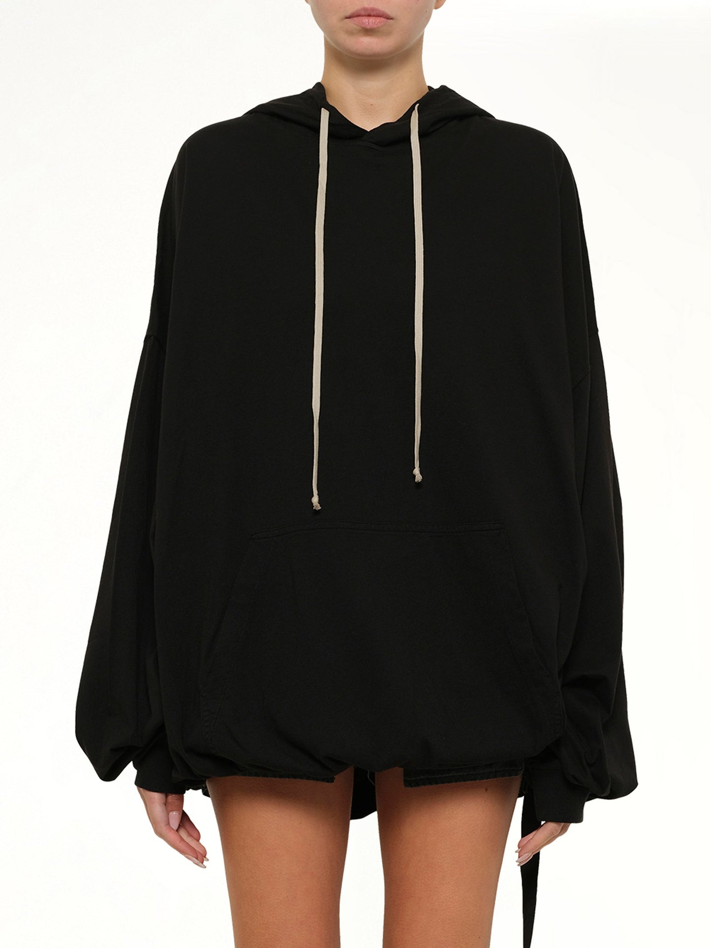 Image of a model wearing Outerwear. Product name - Hun Hoodie in Black colour by brand - RICK OWENS DRKSHDW