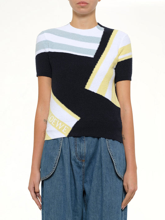 Image of a model wearing Outerwear. Product name - Short Sleeve Sweater in Blue colour by brand - LOEWE