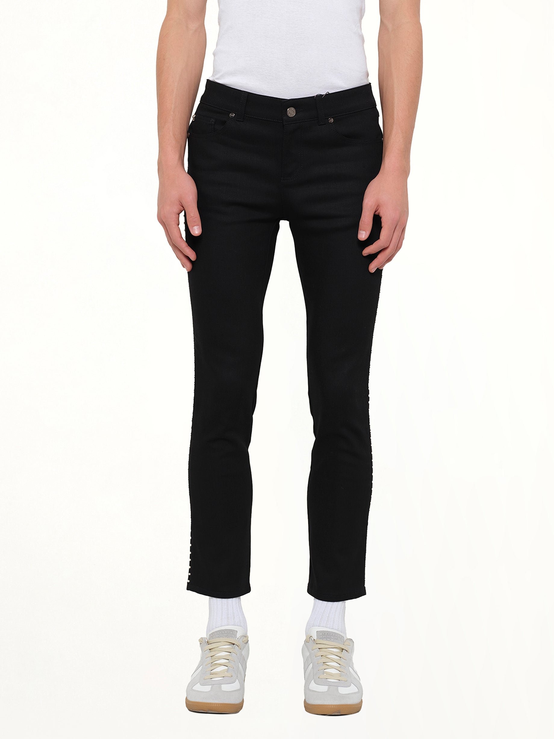 Image of a model wearing Pants. Product name - Trousers in Black colour by brand - ALEXANDER MCQUEEN