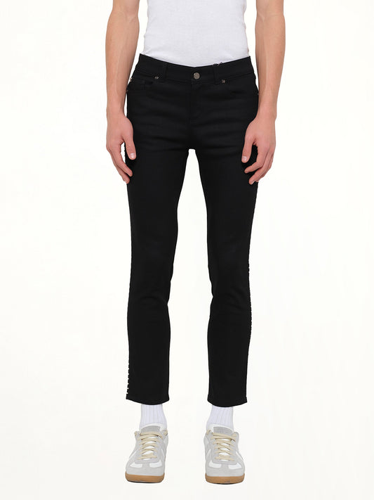 Image of a model wearing Pants. Product name - Trousers in Black colour by brand - ALEXANDER MCQUEEN