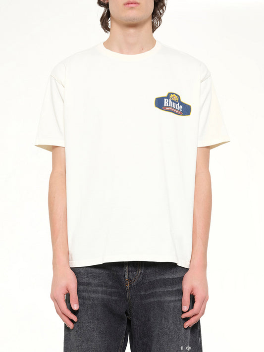 Image of T-Shirts. Product name - Rhude Racing Crest T-Shirt in White colour by brand - RHUDE