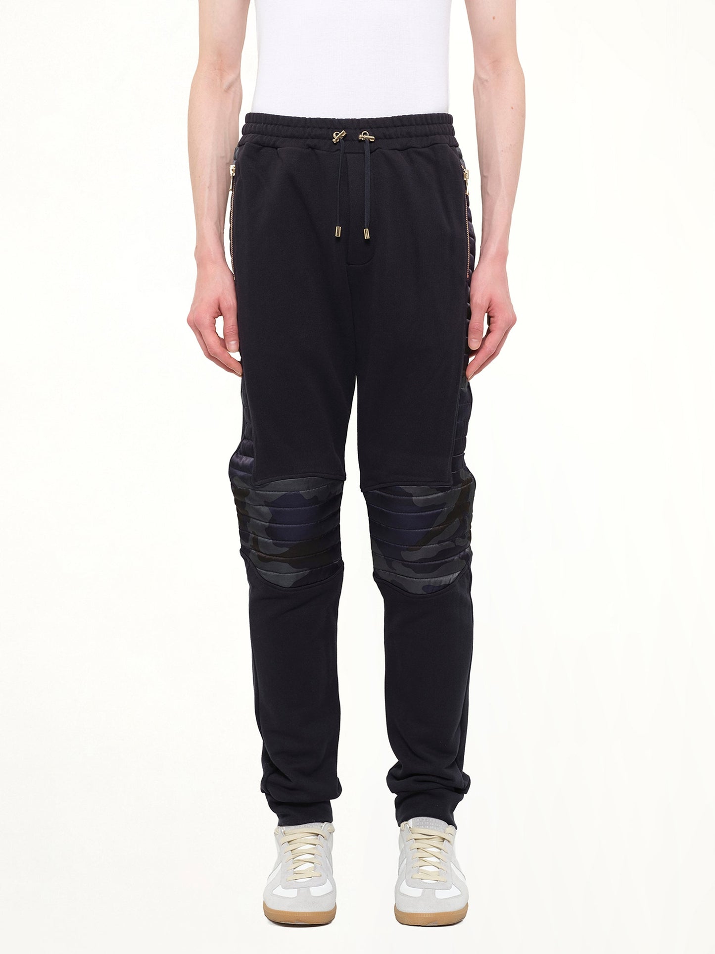 Image of a model wearing Pants. Product name - Biker Legging Pants in Navy colour by brand - BALMAIN