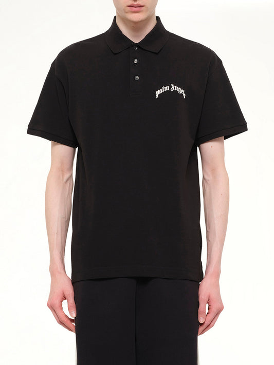 Image of a model wearing Tops. Product name - Back Curved Logo Polo S/S in Black colour by brand - PALM ANGELS