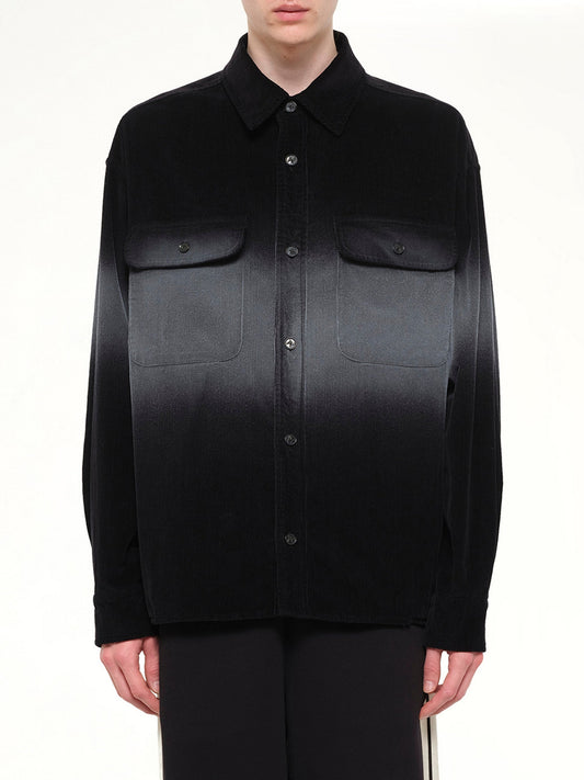 Image of a model wearing Tops. Product name - Faded Effect Classic Logo Loose Overshirt in Black colour by brand - PALM ANGELS