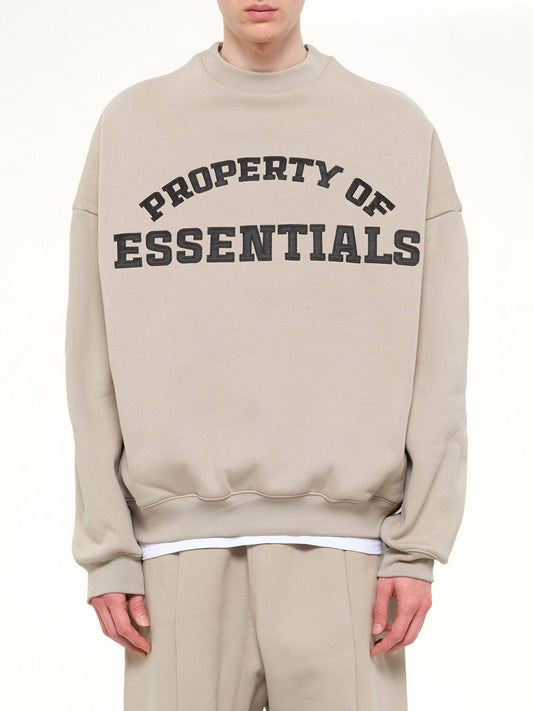 Image of a model wearing Outerwear. Product name - Property Lounge Crewneck Sweatshirt in Grey colour by brand - FEAR OF GOD ESSENTIALS