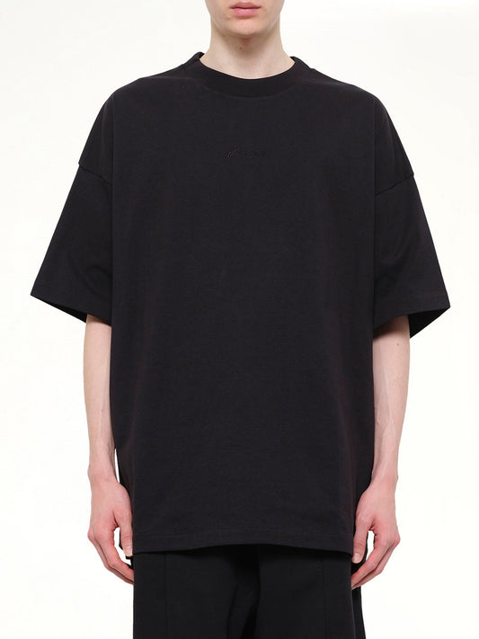 Image of T-Shirts. Product name - Signature 90's Short Sleeve T-Shirt in Black colour by brand - FEAR OF GOD ESSENTIALS