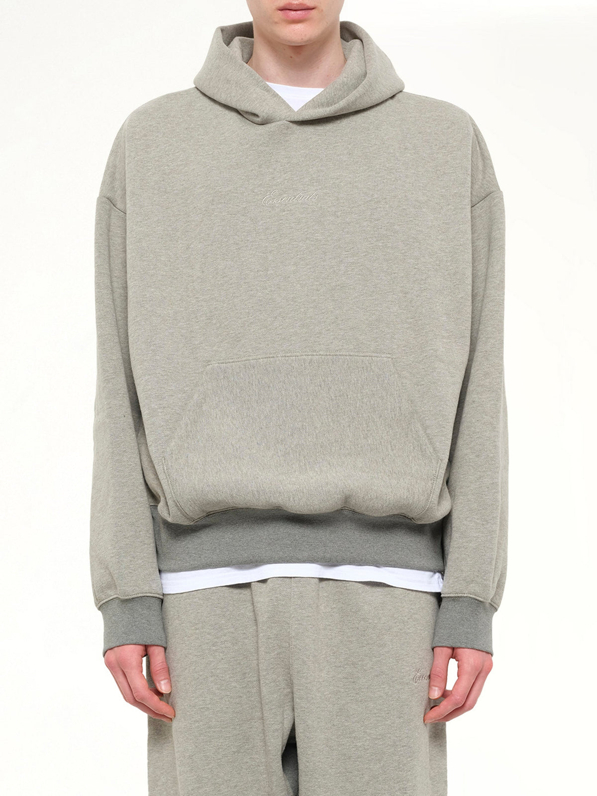 Image of Dolls. Product name - Signature Classic Hoodie in Grey colour by brand - FEAR OF GOD ESSENTIALS