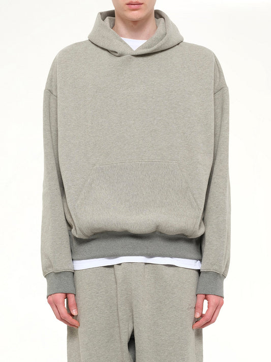 Image of Dolls. Product name - Signature Classic Hoodie in Grey colour by brand - FEAR OF GOD ESSENTIALS