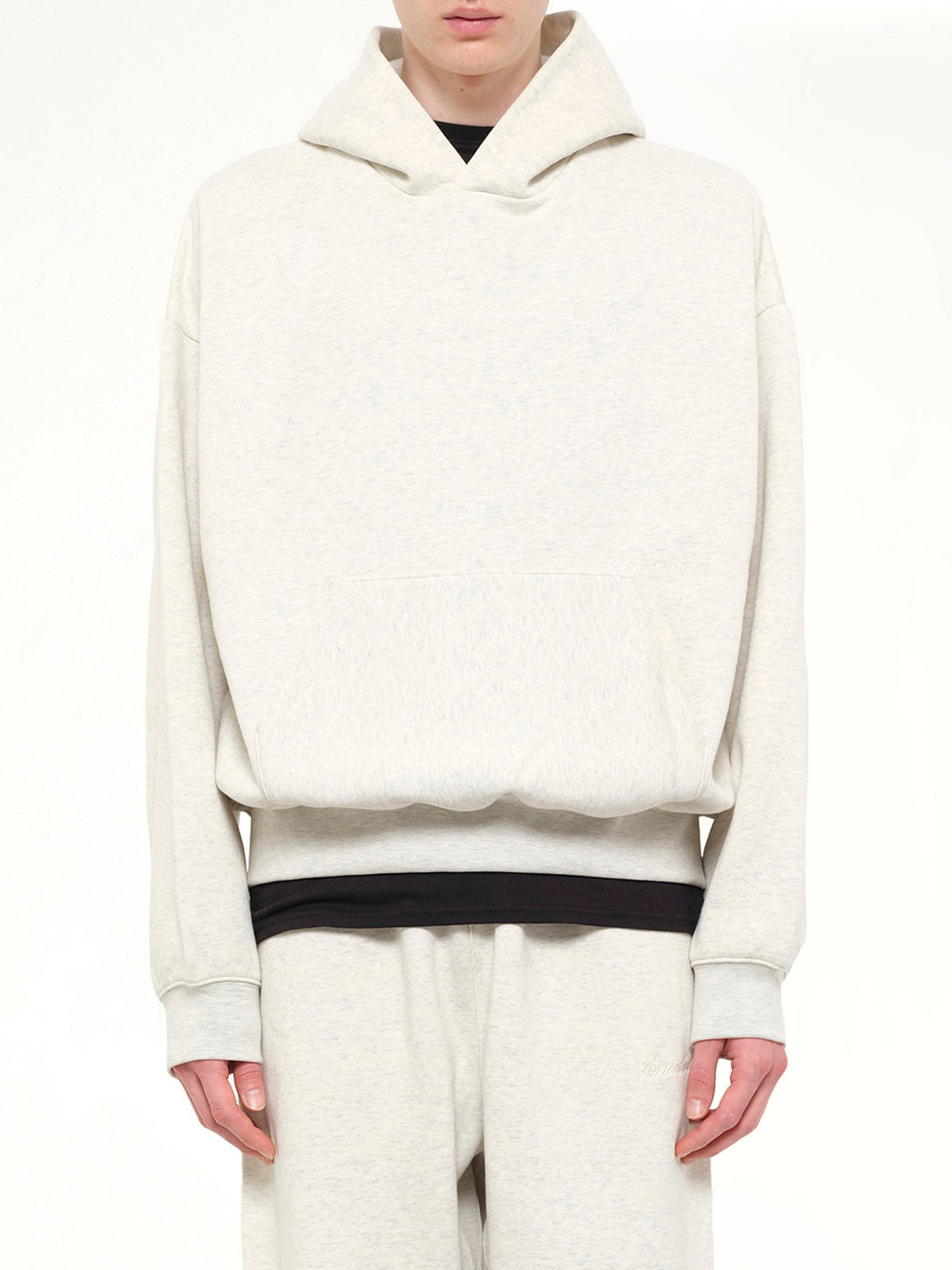 Image of Dolls. Product name - Signature Classic Hoodie in White colour by brand - FEAR OF GOD ESSENTIALS