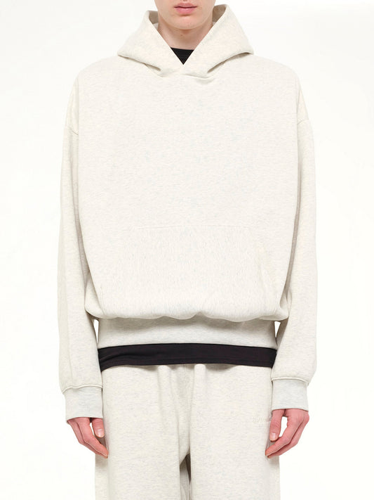 Image of Dolls. Product name - Signature Classic Hoodie in White colour by brand - FEAR OF GOD ESSENTIALS