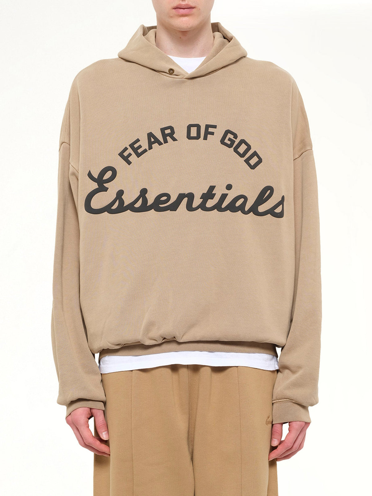 Image of a model wearing Outerwear. Product name - Training 90's Hoodie in Brown colour by brand - FEAR OF GOD ESSENTIALS