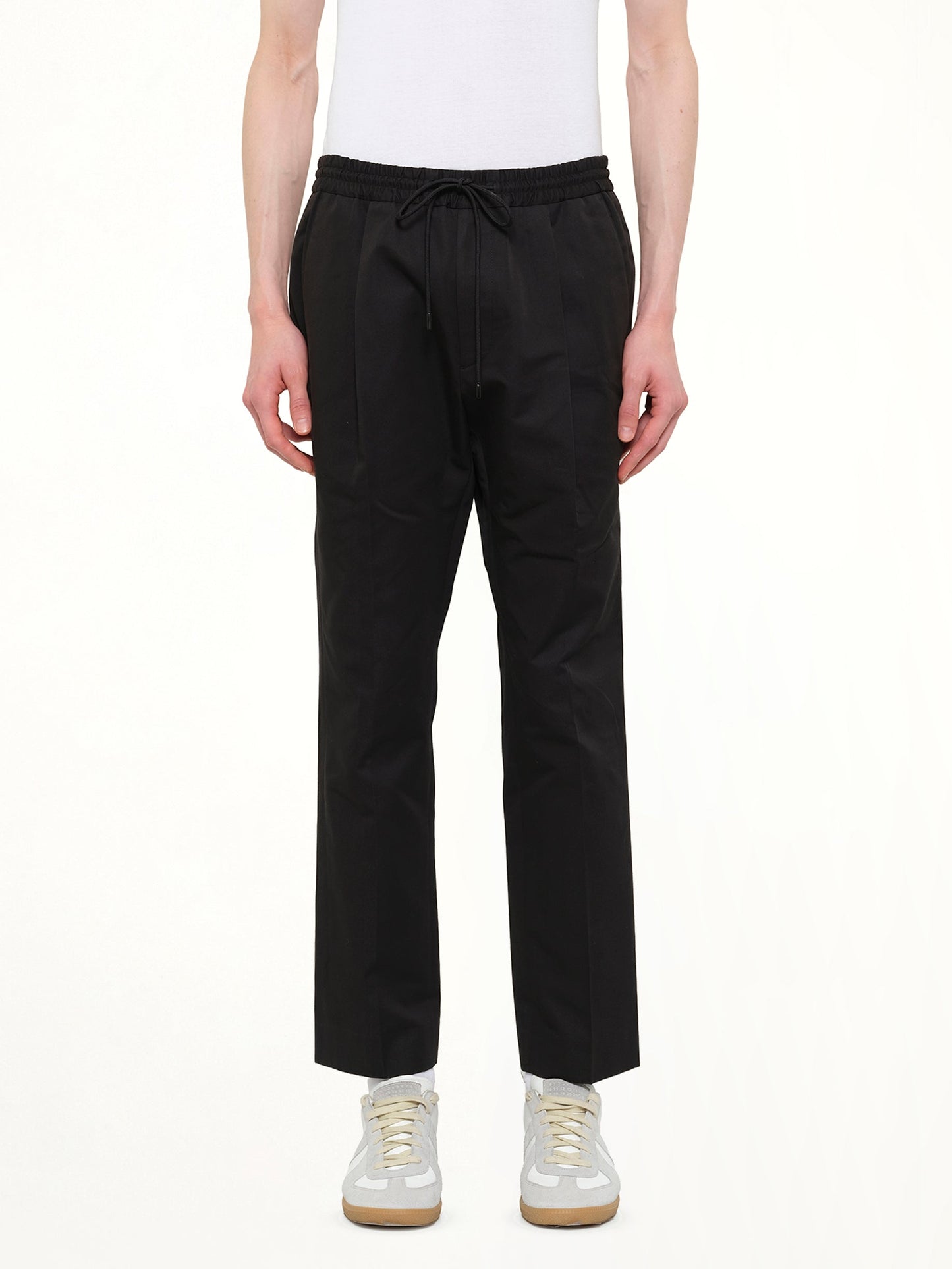 Image of a model wearing Pants. Product name - Juunj Pant in Black colour by brand - JUUNJ