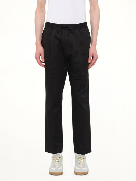 Image of a model wearing Pants. Product name - Juunj Pant in Black colour by brand - JUUNJ