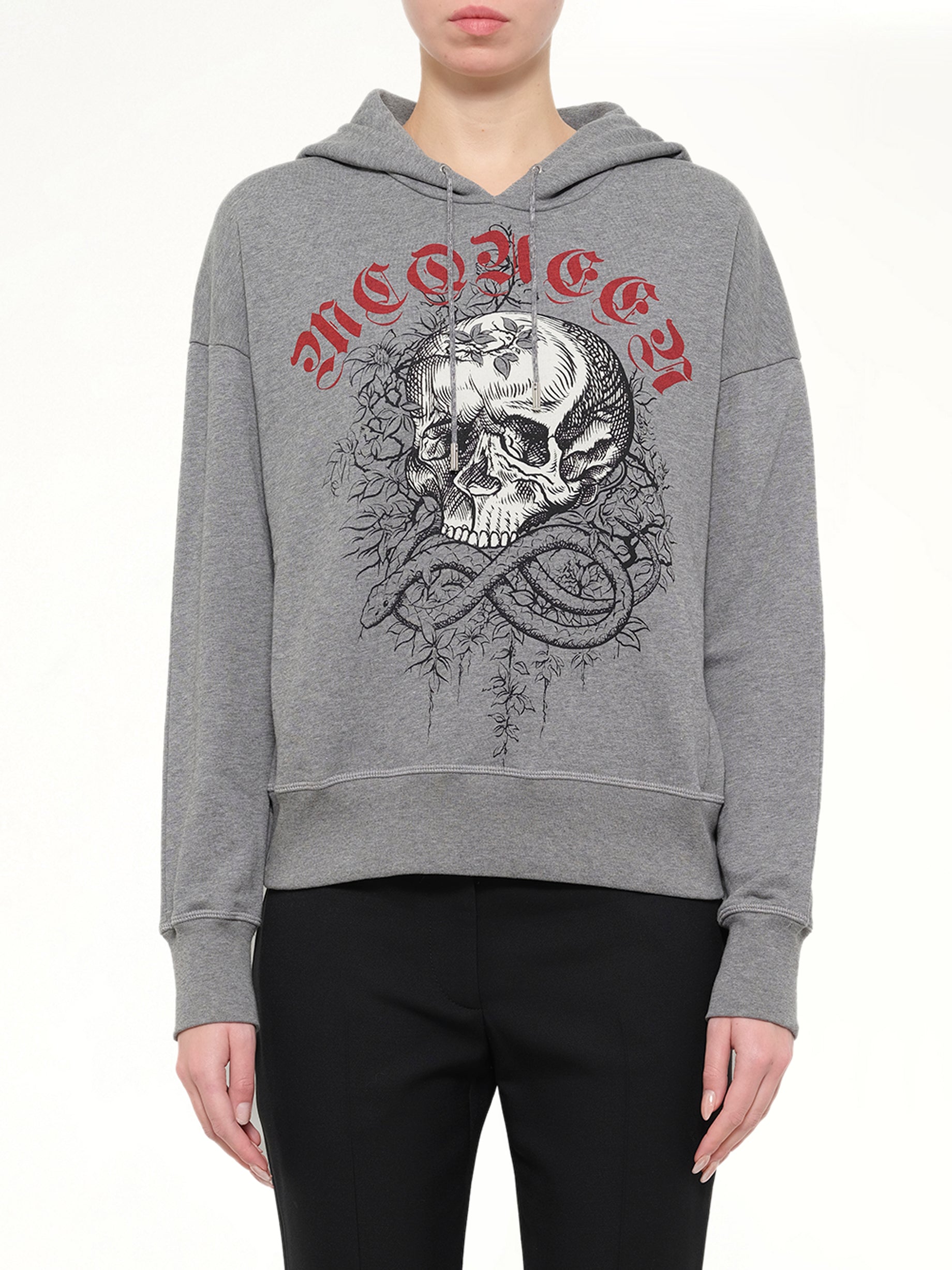 Image of a model wearing Outerwear. Product name - Alexander McQueen Jungle Skull Sweatshirt in Grey colour by brand - ALEXANDER MCQUEEN