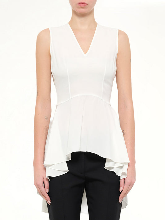 Image of a model wearing Tops. Product name - Alexander McQueen Top in White colour by brand - ALEXANDER MCQUEEN