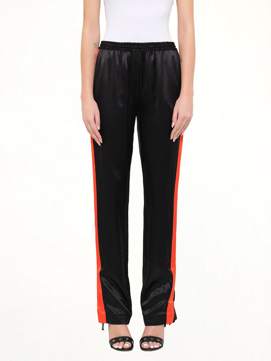 Image of a model wearing Pants. Product name - Givenchy Trousers in Black colour by brand - GIVENCHY
