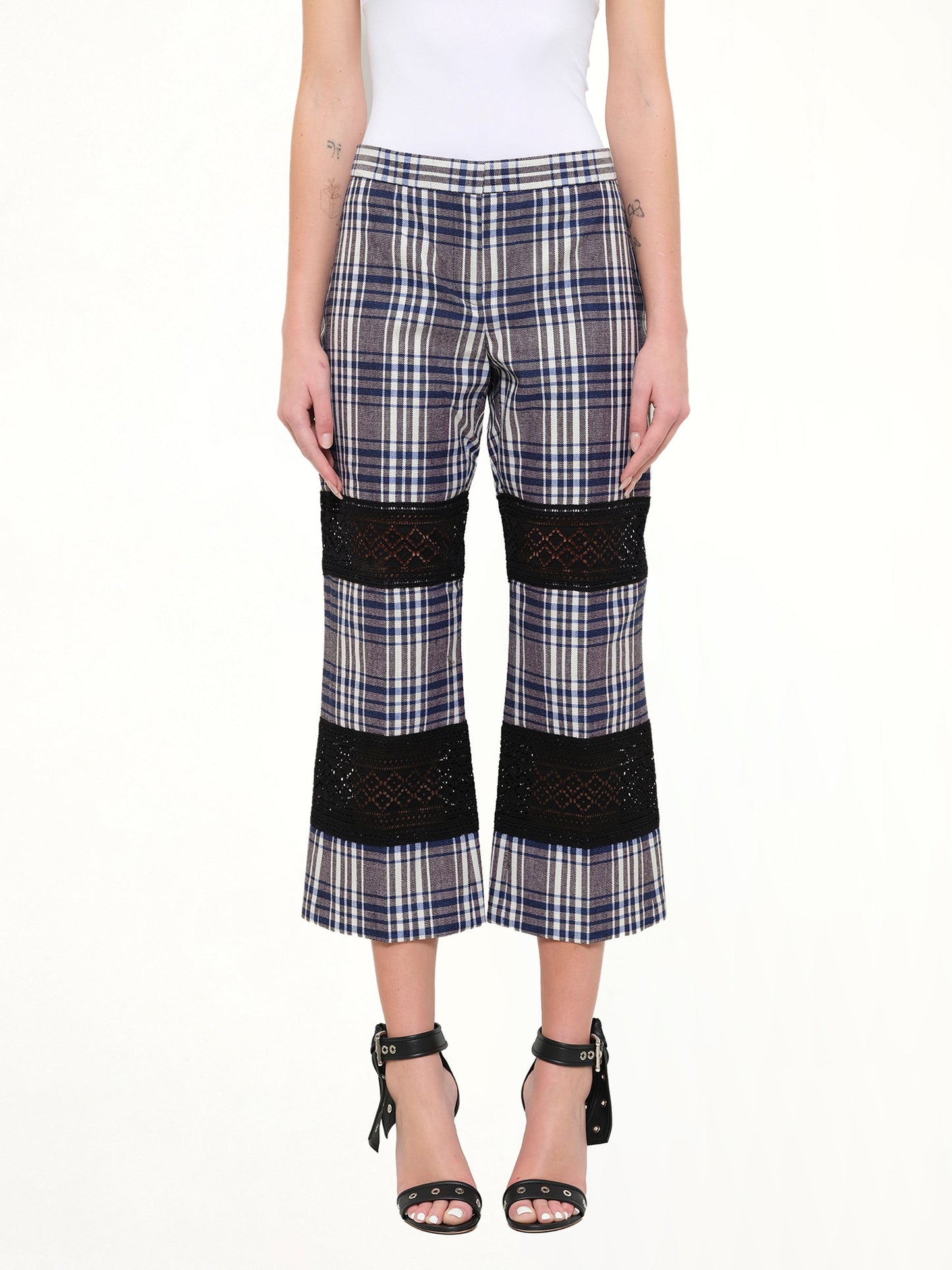 Image of a model wearing Pants. Product name - Macramé Kicks Pants in 1960 colour by brand - ALEXANDER MCQUEEN