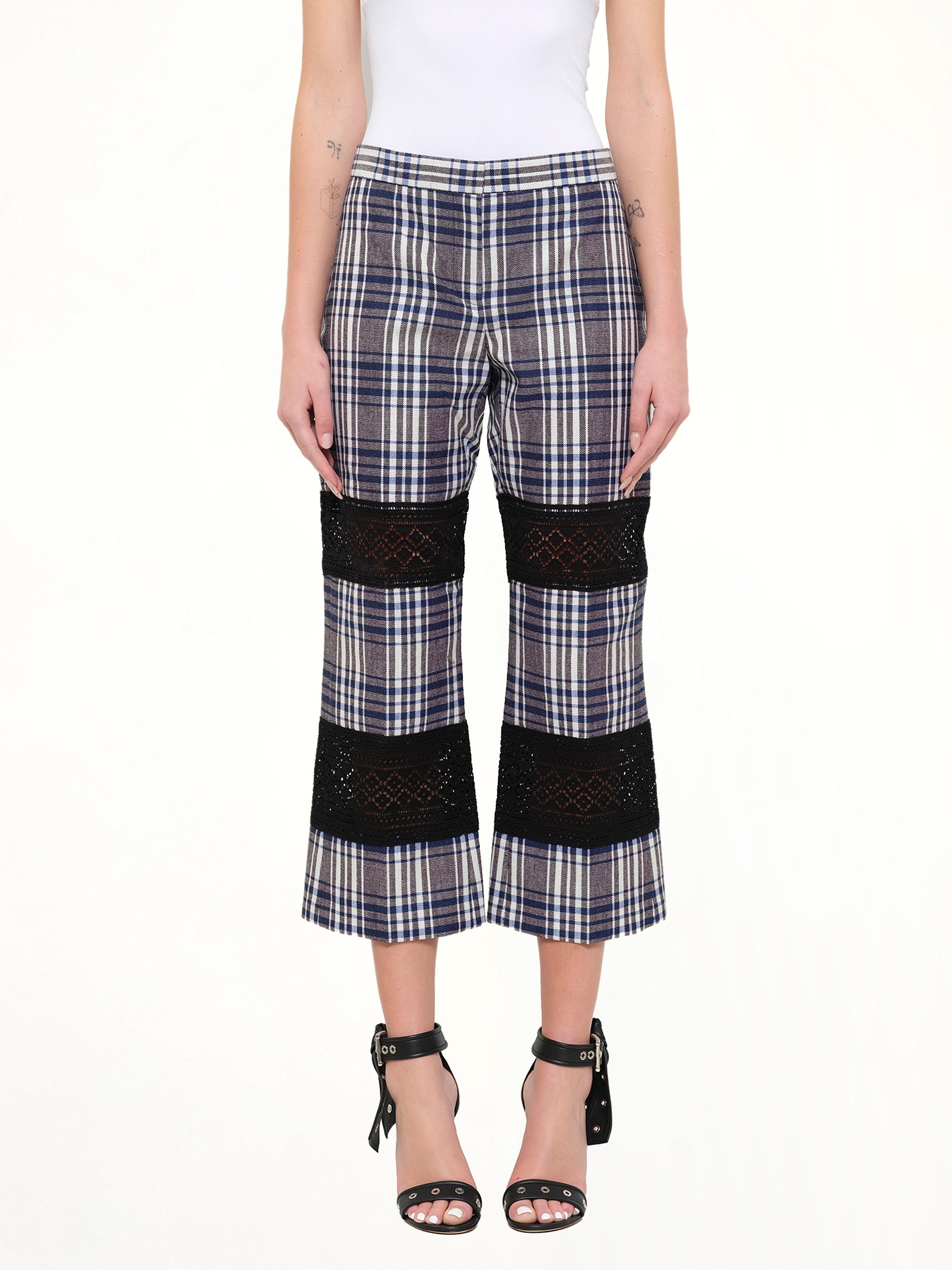 Image of a model wearing Pants. Product name - Macramé Kicks Pants in 1960 colour by brand - ALEXANDER MCQUEEN