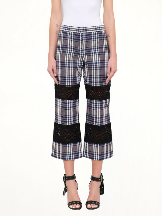 Image of a model wearing Pants. Product name - Macramé Kicks Pants in 1960 colour by brand - ALEXANDER MCQUEEN