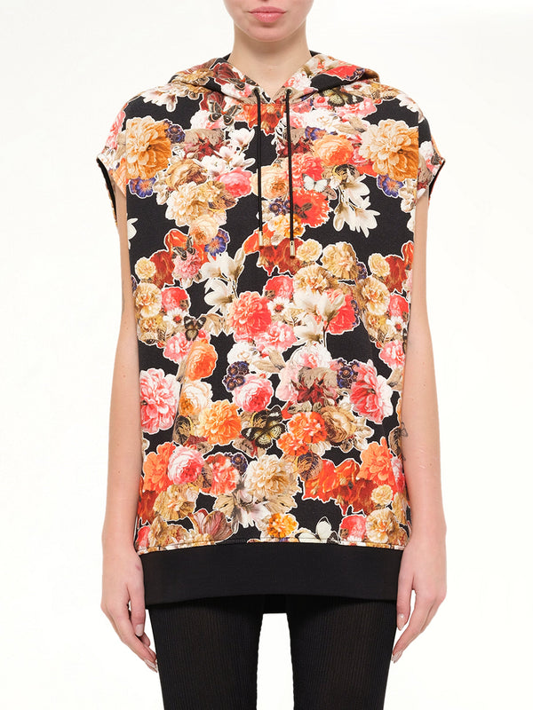 Image of a model wearing Outerwear. Product name - Short Sleeve Hoodie in Black colour by brand - GIVENCHY