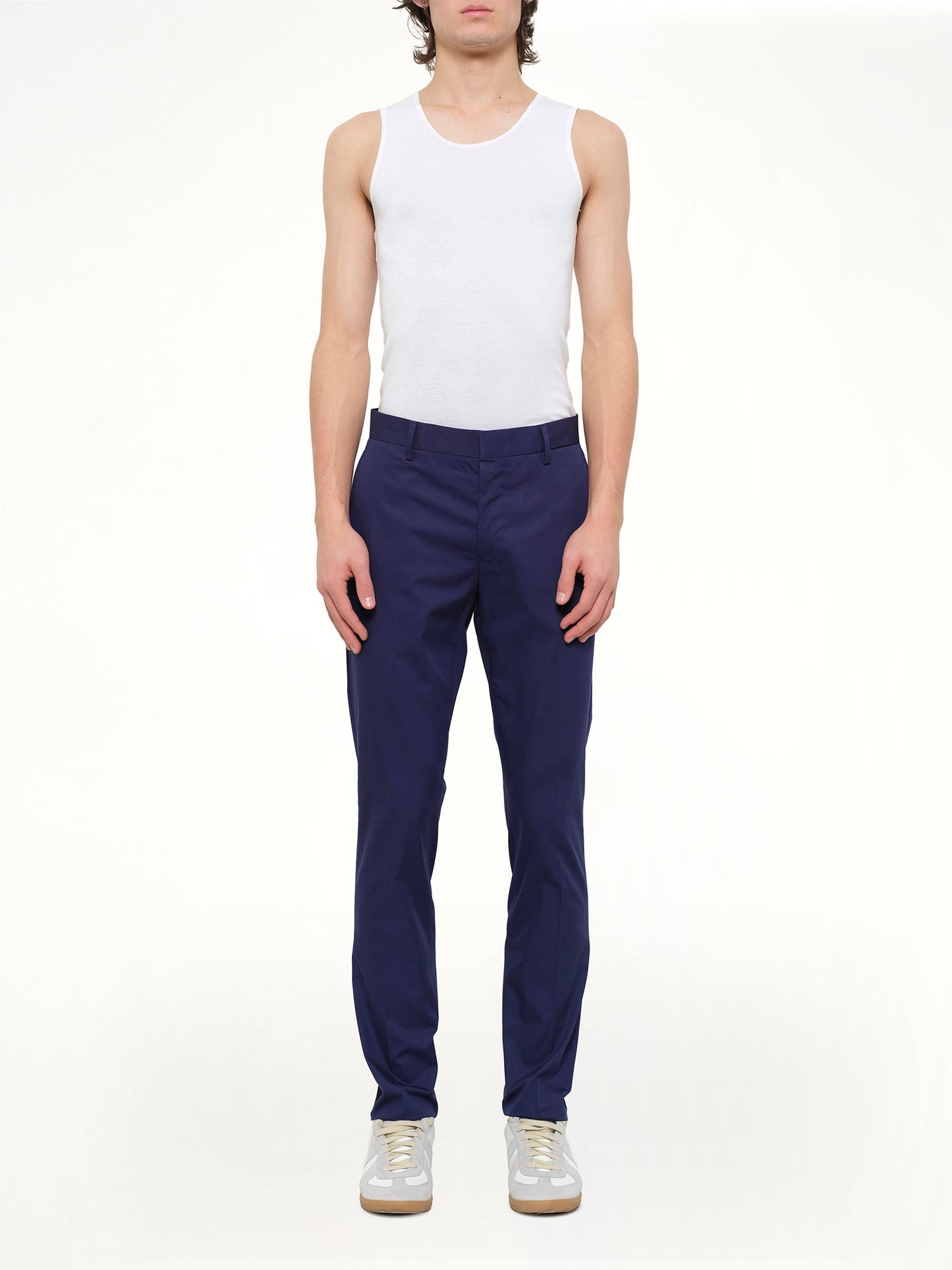 Image of a model wearing Pants. Product name - Chino Slim Rib in Blue colour by brand - LANVIN