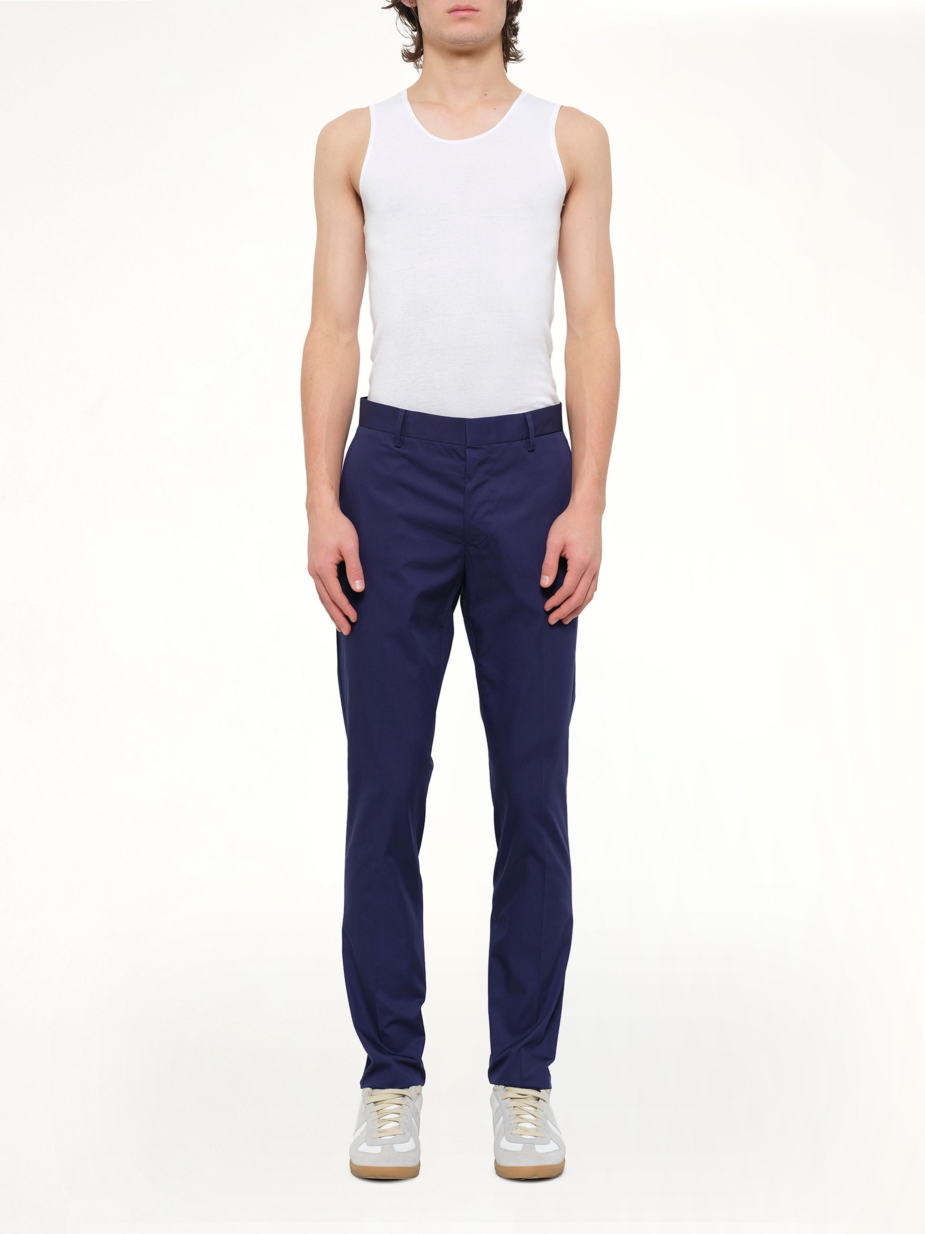 Image of a model wearing Pants. Product name - Chino Slim Rib in Blue colour by brand - LANVIN