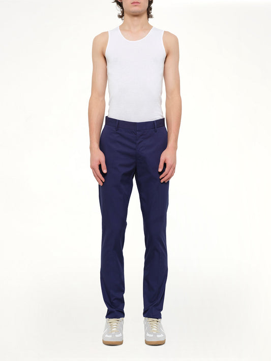 Image of a model wearing Pants. Product name - Chino Slim Rib in Blue colour by brand - LANVIN