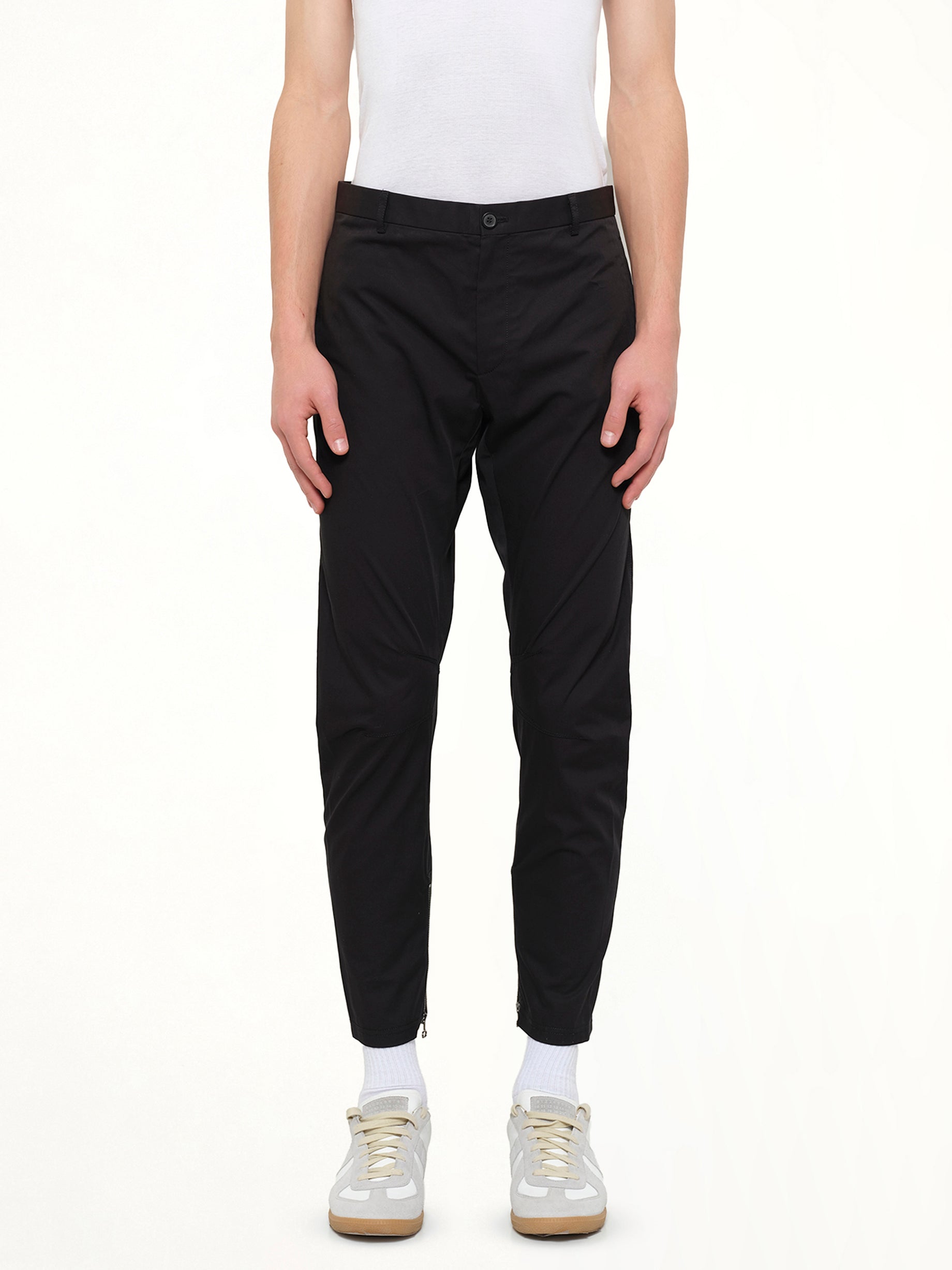 Image of a model wearing Pants. Product name - Cut Biker Pants in Black colour by brand - LANVIN