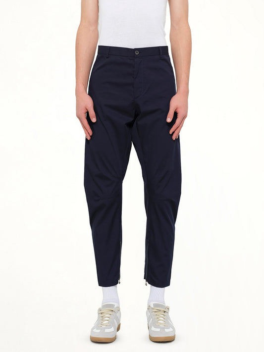 Image of a model wearing Pants. Product name - Cut Biker Pants in Blue colour by brand - LANVIN