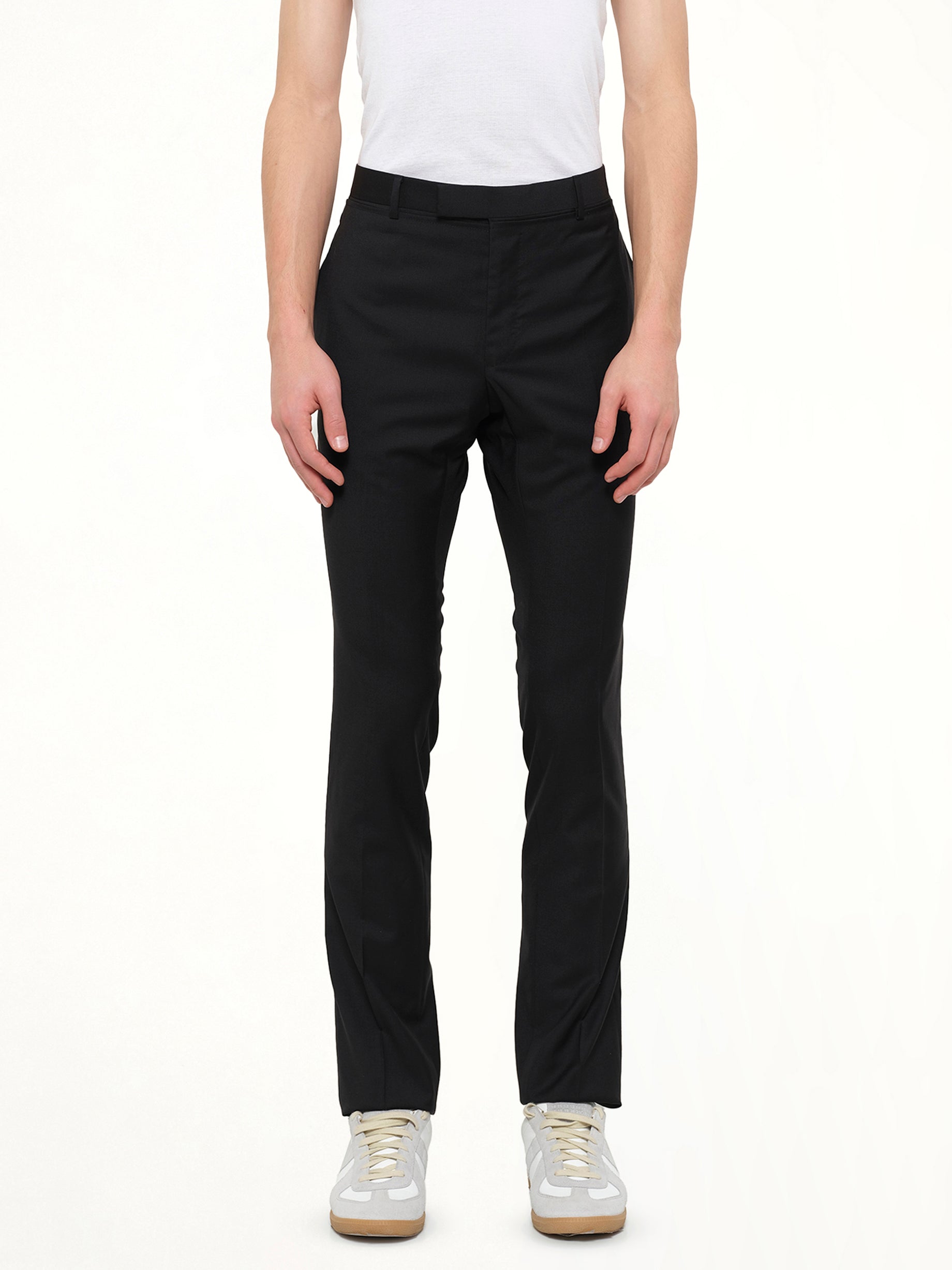 Image of a model wearing Pants. Product name - D8 Skinny Pant in Black colour by brand - LANVIN
