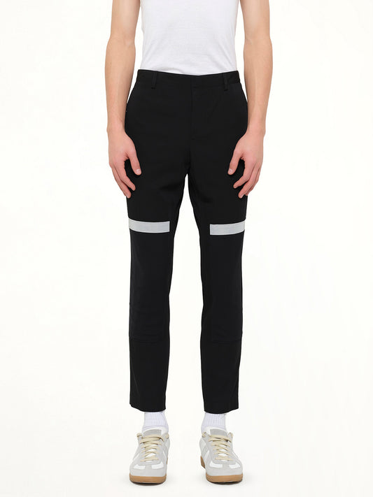 Image of a model wearing Pants. Product name - Lanvin Slim Crop Patch Trousers in Black colour by brand - LANVIN