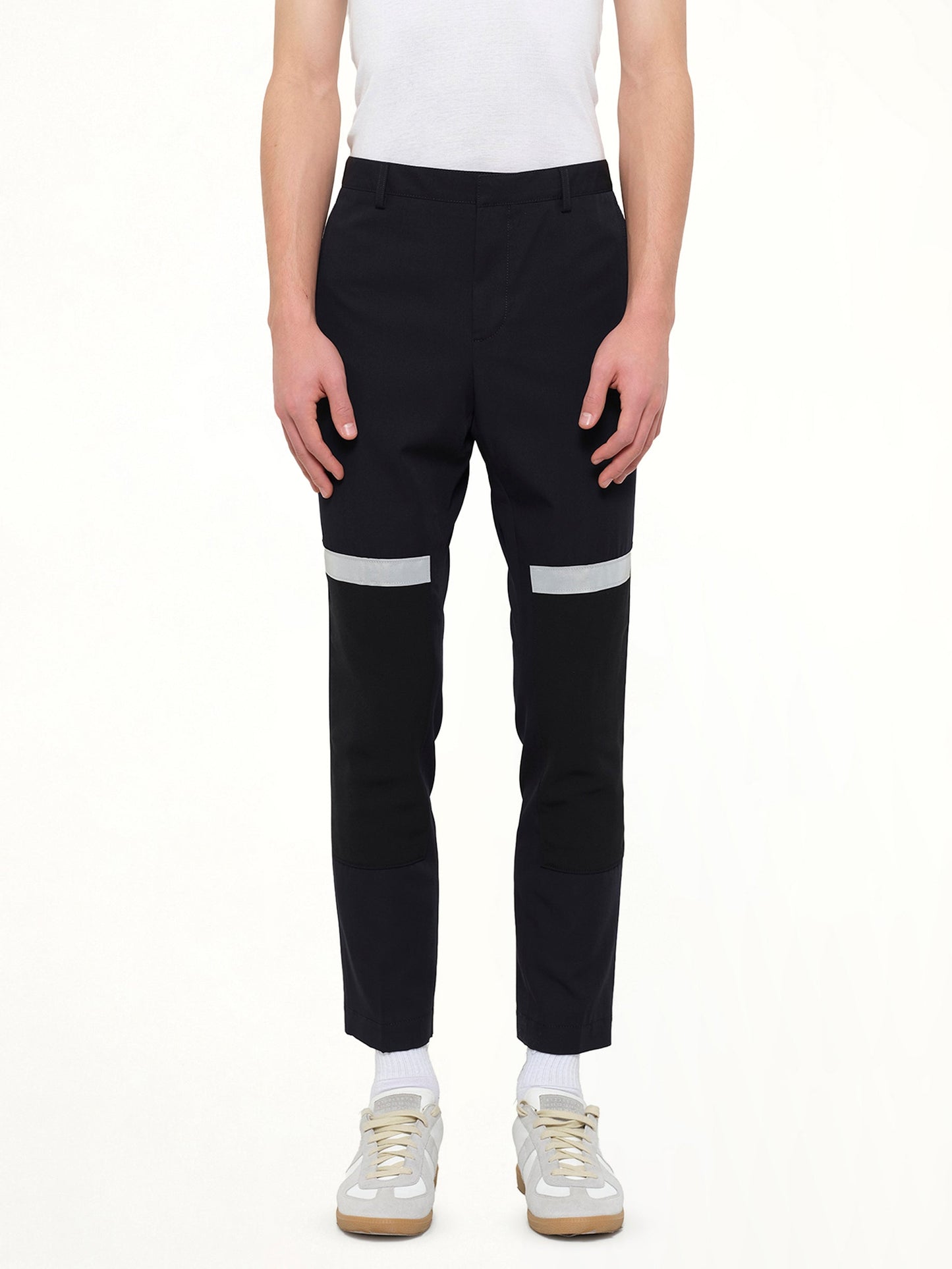 Image of a model wearing Pants. Product name - Slim Crop Patch in Blue colour by brand - LANVIN