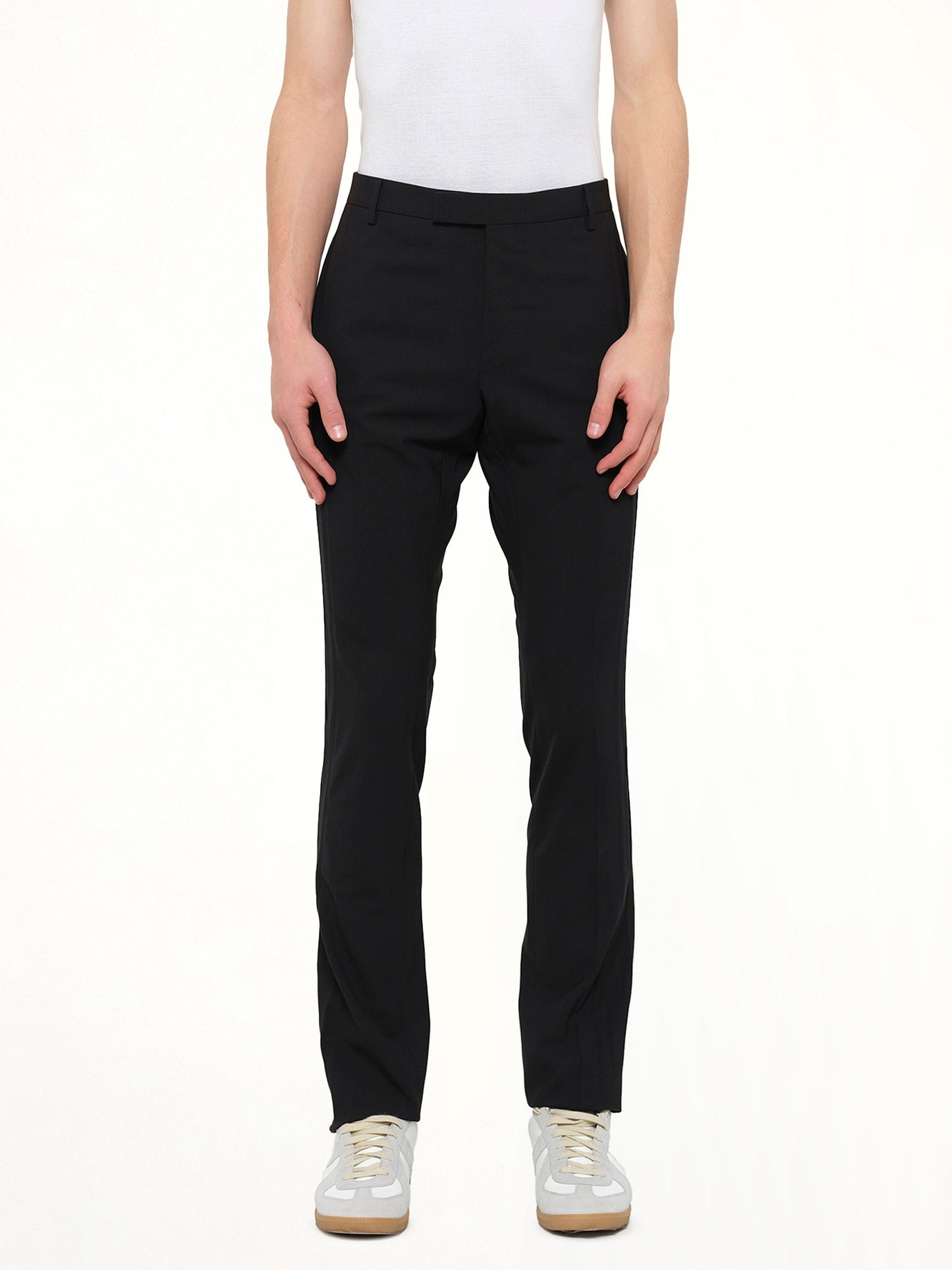 Image of a model wearing Pants. Product name - Slimfit Pants in Black colour by brand - LANVIN