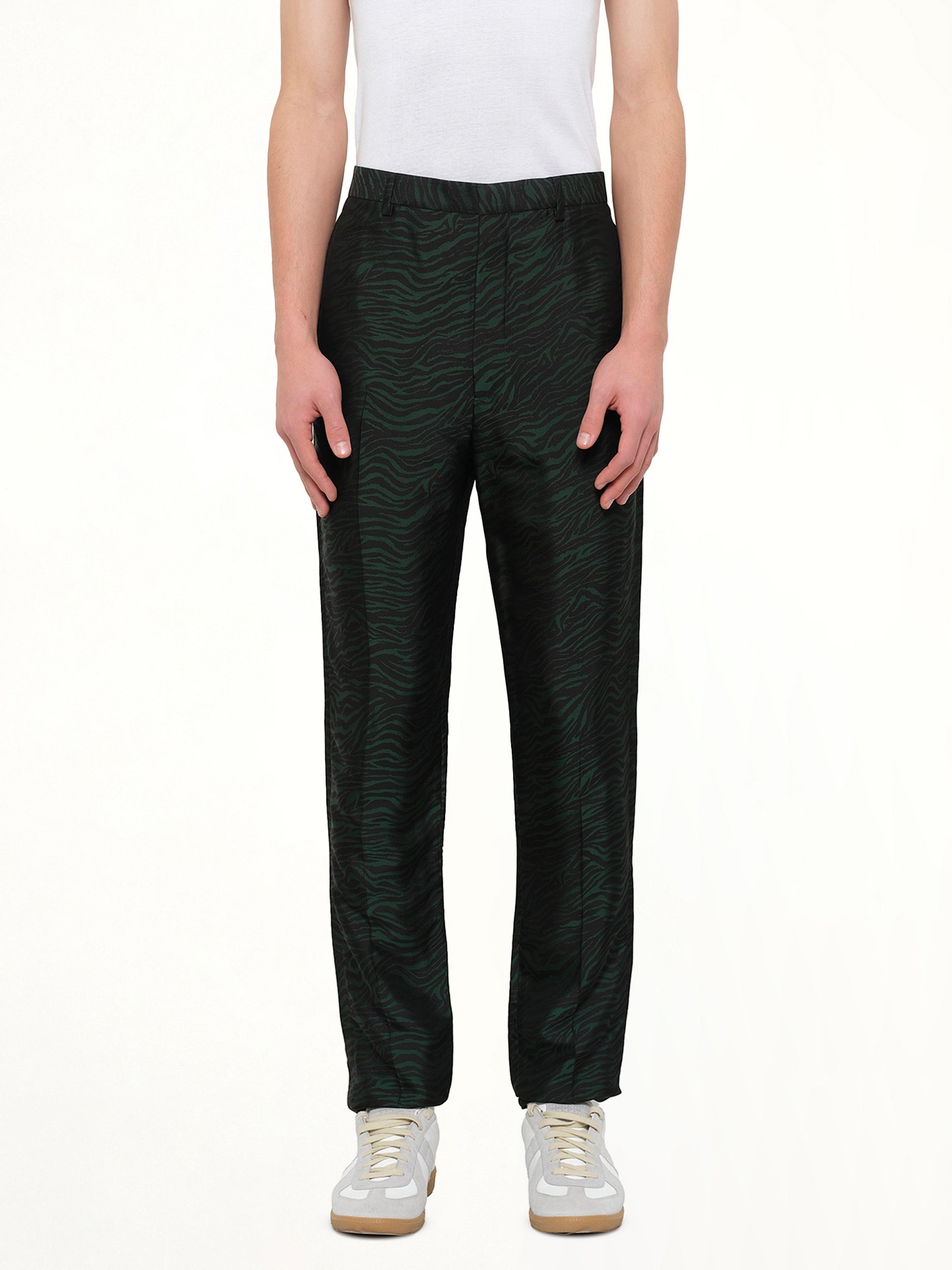 Image of a model wearing Pants. Product name - Zebra Jacquard Pant in Green colour by brand - LANVIN