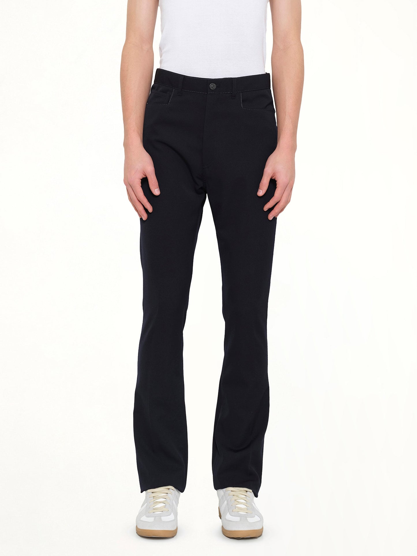 Image of a model wearing Pants. Product name - Fit 5 Pocket Pants in Navy colour by brand - LANVIN