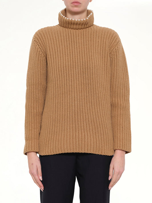 Image of a model wearing Outerwear. Product name - High Pearls Sweater in Camel colour by brand - LOEWE