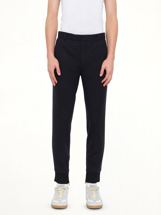 Image of a model wearing Pants. Product name - Jogging Pants in Navy colour by brand - LANVIN