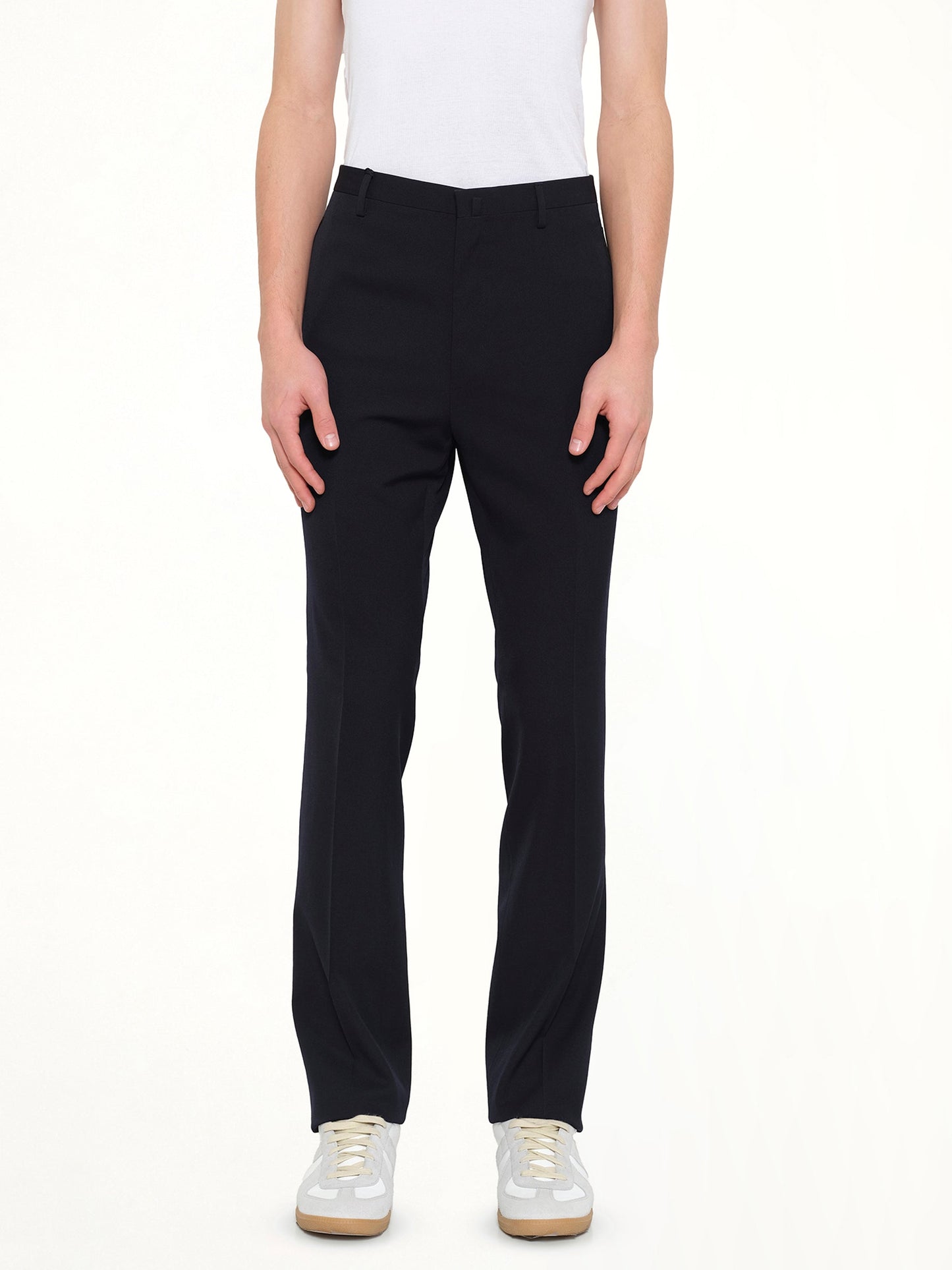 Image of a model wearing Pants. Product name - Pants W/ Ribbon Pocket in Navy colour by brand - LANVIN