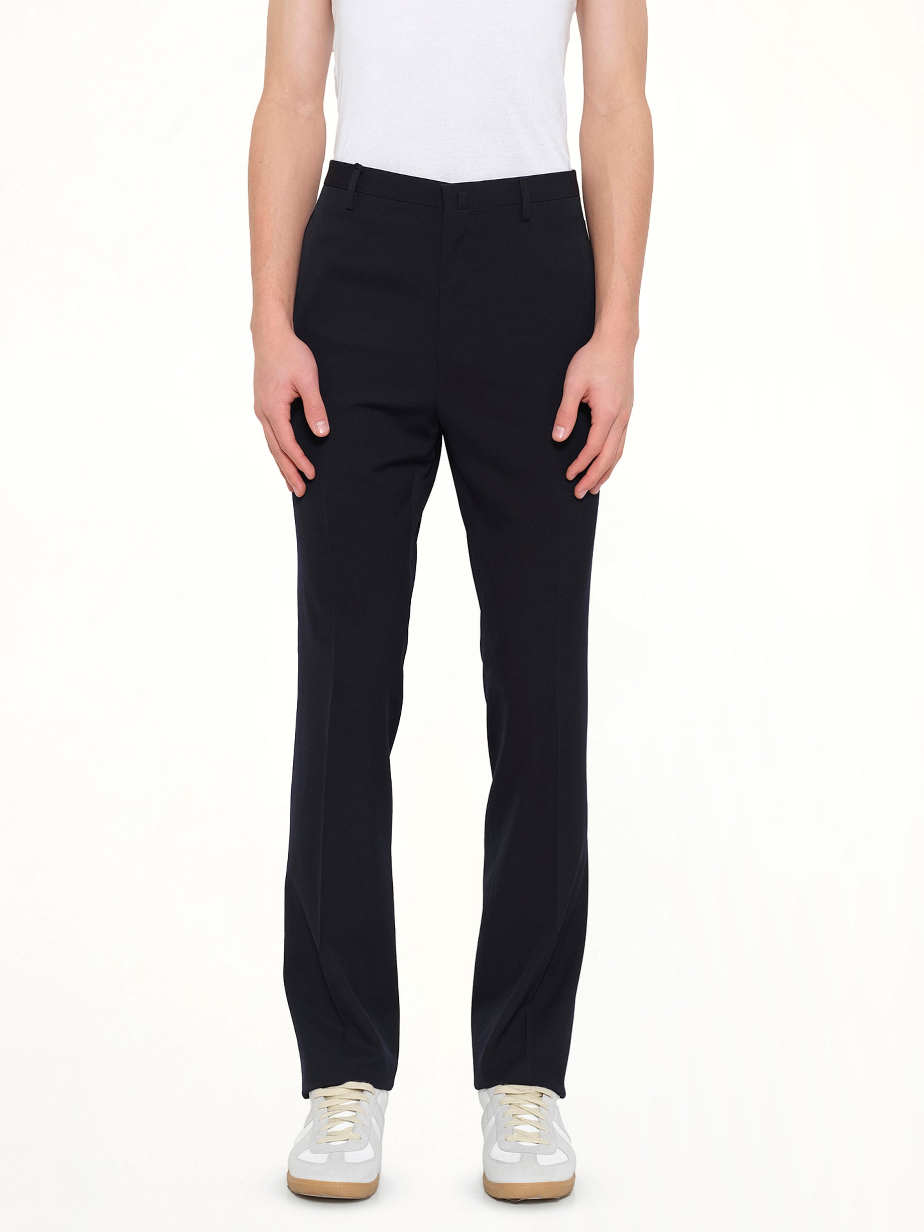 Image of a model wearing Pants. Product name - Pants W/ Ribbon Pocket in Navy colour by brand - LANVIN