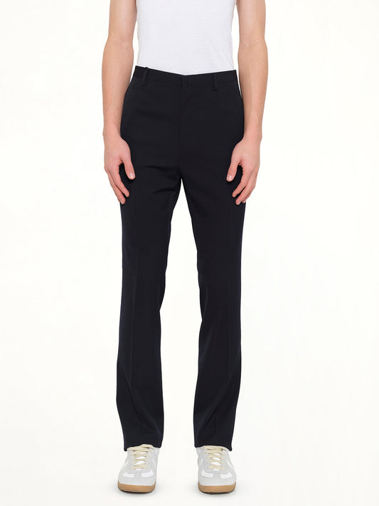 Image of a model wearing Pants. Product name - Pants W/ Ribbon Pocket in Navy colour by brand - LANVIN