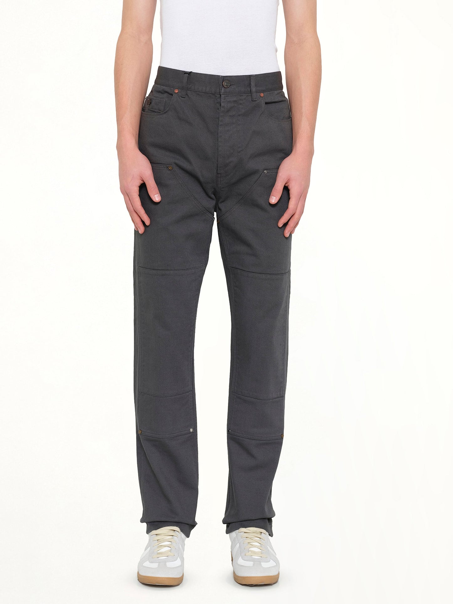 Image of a model wearing Pants. Product name - Patch Pants in Anthracite colour by brand - LANVIN